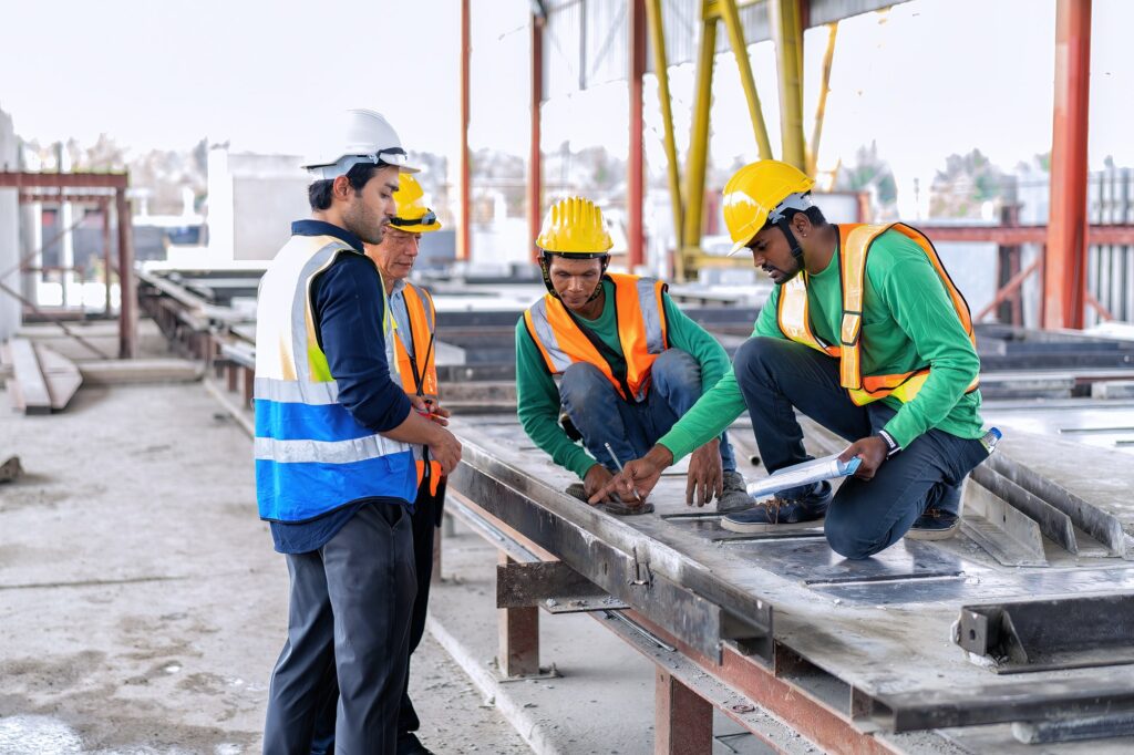 At building construction site engineer check quality precast concrete panel before installation